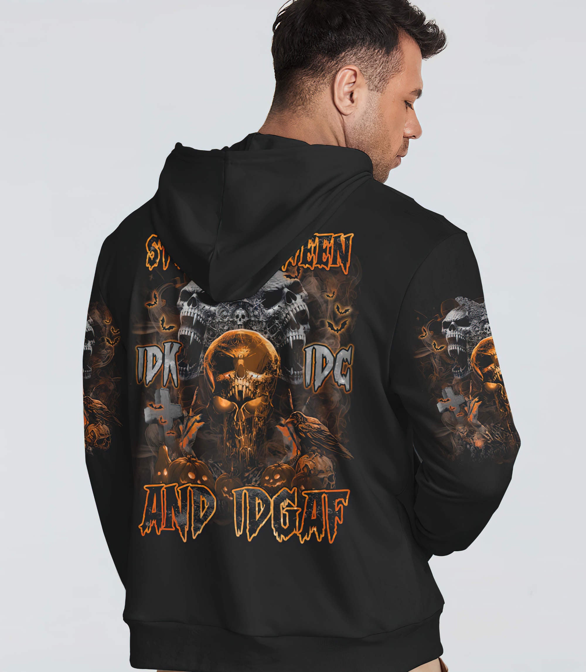 stuck-between-evil-skull-halloween-all-over-print-hoodie