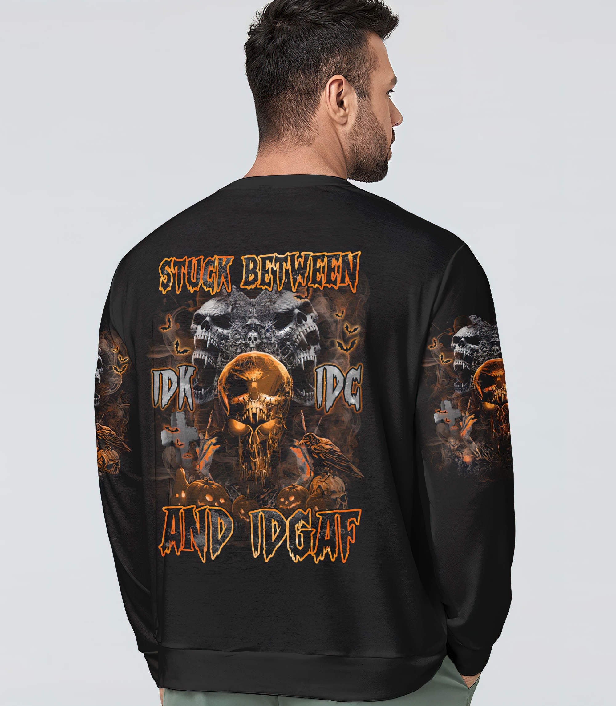 stuck-between-evil-skull-halloween-all-over-print-sweatshirt