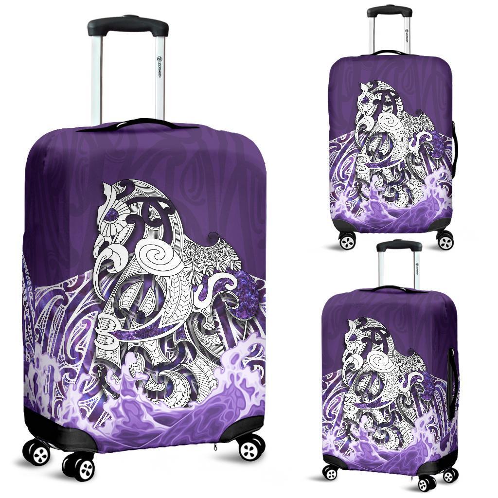 maori-manaia-the-blue-sea-luggage-covert-purple